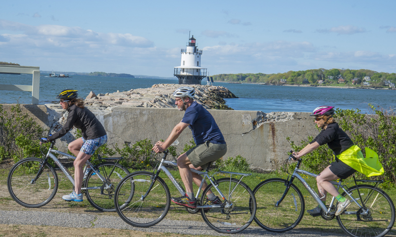 Group Biking near Lighthouse, Photo Courtesy of Summer Feet Cycling