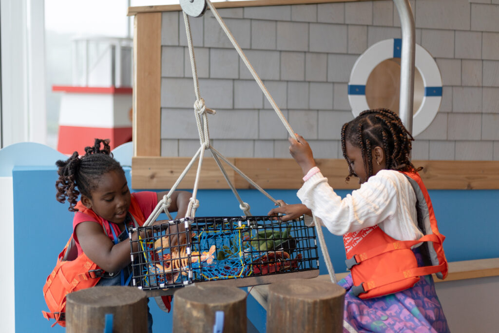 Kids Playing in Lobster Boat. Photo Credit: Hannah Elsworth