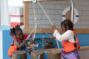Kids Playing in Lobster Boat. Photo Credit: Hannah Elsworth