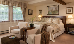 Captain Jefferds Inn Guestroom with Lounge Area, Photo Courtesy of Kennebunkport Captains Collection