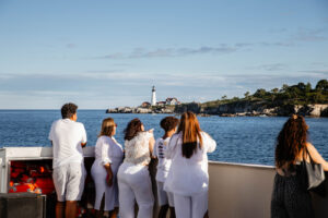 Cruising past Portland Head Light on Casablanca Cruises. Photo Credit: Cailyn Burke/@cailyns_camera
