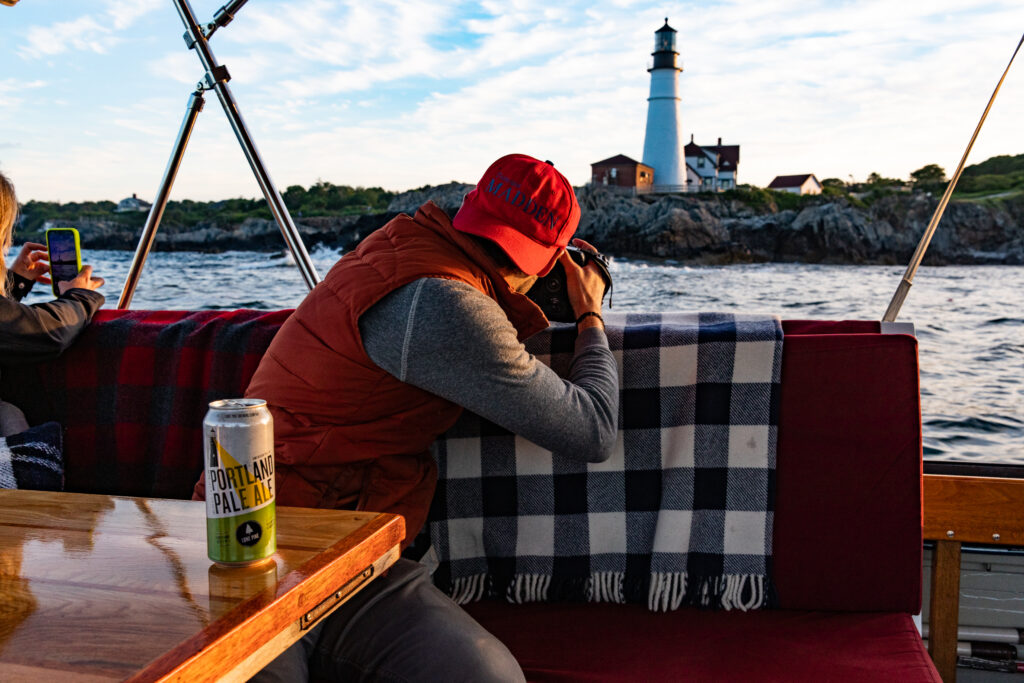 Sunset Cruise by Portland Head Light. Photo Credit: Casco Bay Custom Charters