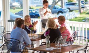 Outdoor Seating. Photo Provided by Higgins Beach Inn Outdoor Seating. Photo Provided by Higgins Beach Inn