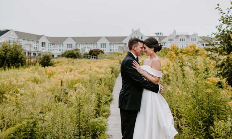 Wedding Couple outside Hotel. Photo Provided by Inn by the Sea