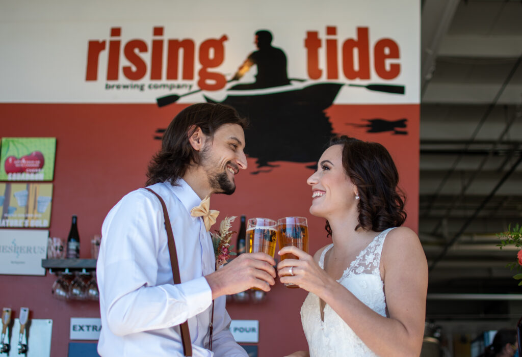 Wedding Couple at Rising Tide. Photo Credit:: Leah's Lens Wedding Couple at Rising Tide. Photo Credit:: Leah's Lens