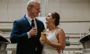 Wedding Couple at Rising Tide. Photo Credit: Little Redd Photography