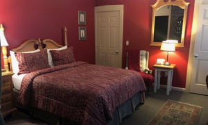 Red King Bedroom, Photo Courtesy of Percy Inn - listing