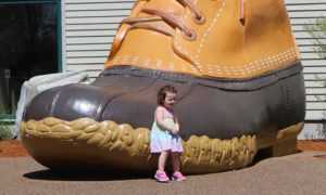 Child in front of Bean Boot. Photo Provided by L.L.Bean