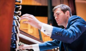 Playing Organ. Photo Provided by Kotzschmar Organ