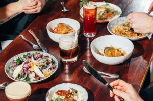 Dining at Sur Lie. Photo Credit: Dawson Renaud Film & Photo