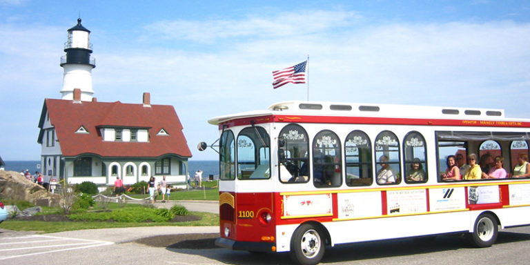 Trolley at Portland Head Light. Photo Provided by Portland Discovery Land & Sea Tours Trolley at Portland Head Light. Photo Provided by Portland Discovery Land & Sea Tours