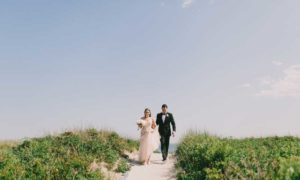 Wedding Couple on Beach Path. Photo Provided by Inn by the Sea