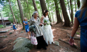 Walking to Wedding Ceremony. Photo Provided by Migis Lodge on Sebago Lake