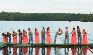 Wedding Party by Lake. Photo Provided by Maine Camp Experience