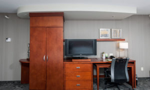 Desk and TV. Photo Provided by Courtyard by Marriott