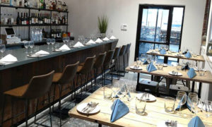 Dining room and bar. Photo Provided by Bow Street Beverage