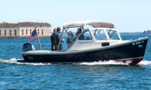 Boat by Fort Gorges. Photo Provided by Fogg’s Water Taxi & Charters