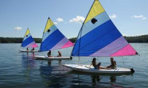 group of kids out parasailing maine summer camp