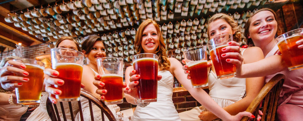 Bridal Party Having Beer. Photo Credit: Bethany and Dan Photography