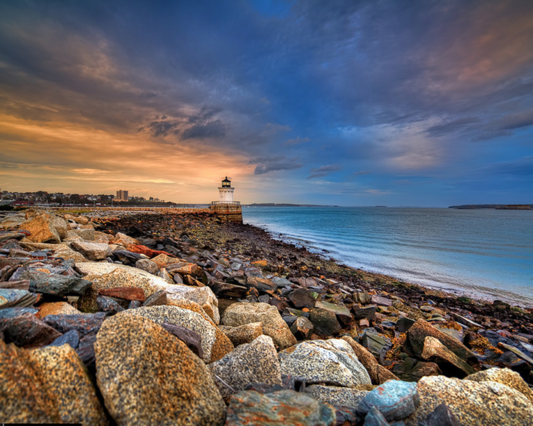 Lighthouse Along Rocky Shore, Photo Credit: Kim Seng Lighthouse Along Rocky Shore, Photo Credit: Kim Seng