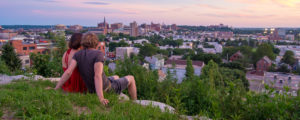 Couple on Hilltop Overlooking City, Photo Credit: Corey Templeton