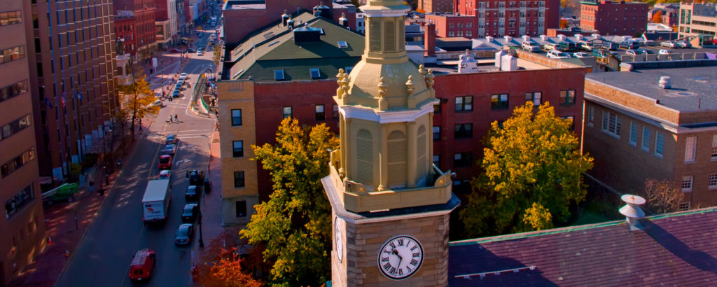 Portland Skyline in Front of Clock Tower, Photo Credit: Cynthia Farr-Weinfeld