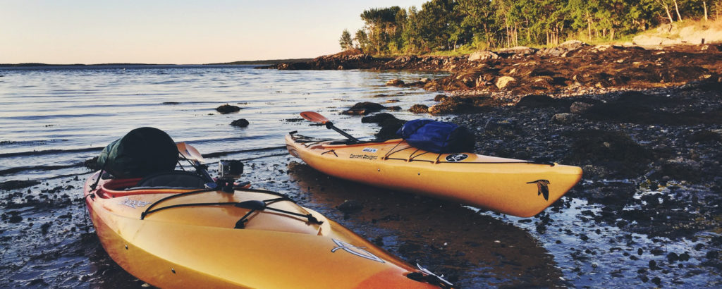 Kayaks Docked on Beach, Photo Credit: Rippleeffect