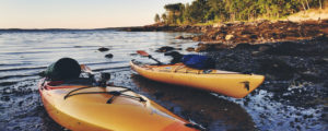 Kayaks Docked on Beach, Photo Credit: Rippleeffect