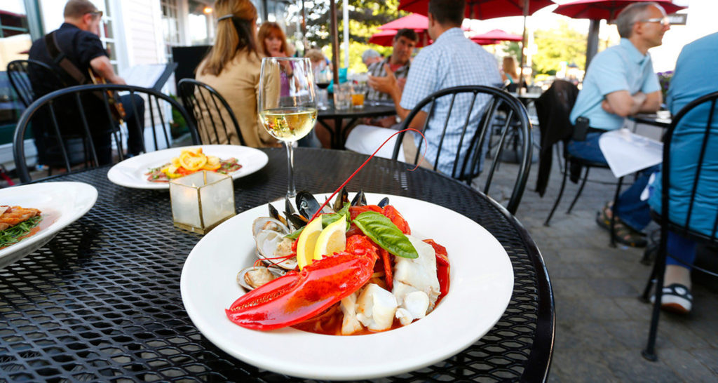 Photo Credit: Visit Freeport,Enjoy a lobster dinner while being outside in the fresh Maine air during hot summer months.