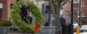 Holiday Wreath Hanging over Lobsterman Statue in Portland, Photo Credit: Corey Templeton