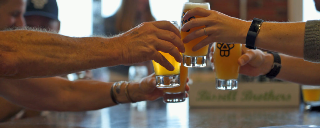 Group Cheers at Brewery, Photo Courtesy of Visit Portland / GLP Films