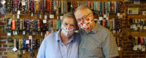 Couple in lobster masks at Uncommon Paws, Photo Courtesy of Good Maine
