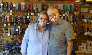 Couple in lobster masks at Uncommon Paws, Photo Courtesy of Good Maine