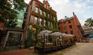 Green Moss Covered Building in Downtown Portland, Photo Credit: Visit USA Parks and Tobey Schmidt