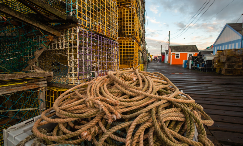 Lobster Crates and Pile of Rope on Working Waterfront, Photo Credit: Visit USA Parks and Tobey Schmidt