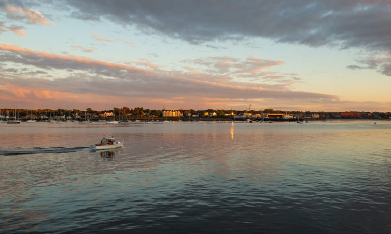 Portland Cityscape from Casco Bay with Lobster Boat, Photo Credit: Visit USA Parks and Tobey Schmidt Portland Cityscape from Casco Bay with Lobster Boat, Photo Credit: Visit USA Parks and Tobey Schmidt