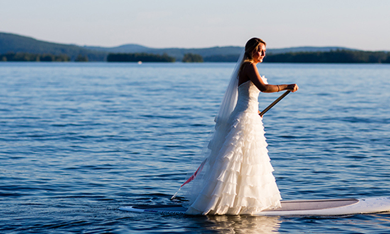 Bride Stand-Up Paddleboarding, Photo Credit: Emilie Inc.