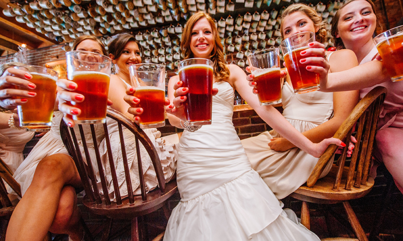 Group of Women Holding Beers, Photo Credit: Bethany and Dan Photography