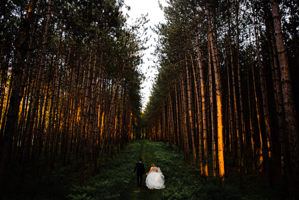 Couple at a Tree Farm. Photo Credit: Bethany and Dan Photography