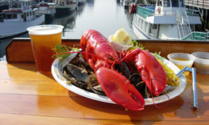 Plated Lobster Dinner with Ocean Views, Photo Credit: Portland Lobster Company