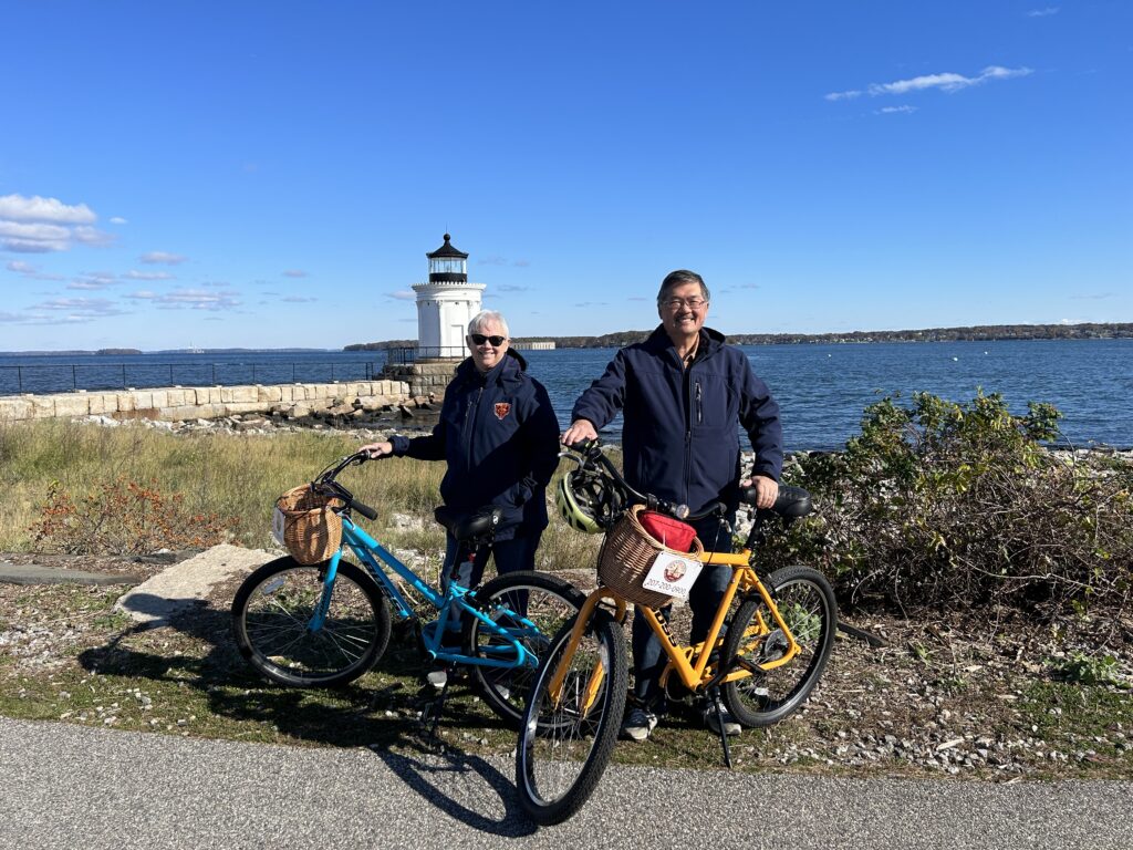 Biking by Lighthouse. Photo Credit: Leah Day Biking by Lighthouse. Photo Credit: Leah Day