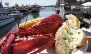 Lobster Dinner with view down the wharf, Photo Credit: Portland Lobster Company