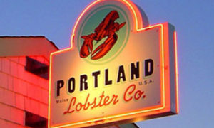 PLC sign at dusk, Photo Credit: Portland Lobster Company