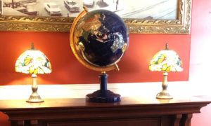 Globe on desk at Inn at St. John- Photo Provided by Inn at St. John
