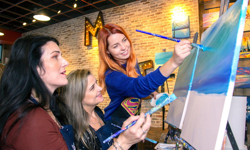 Group Painting at Muse Paintbar, Photo Courtesy of Muse Paintbar Group Painting at Muse Paintbar, Photo Courtesy of Muse Paintbar