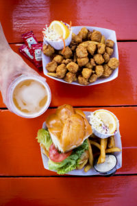 Meal on waterfront. Photo Credit: Capshore Photography