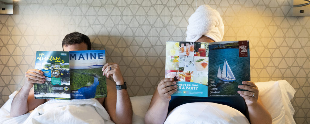 Amy + Dan at Hotel with Magazines, Photo Credit: Capshore Photography