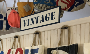 Vintage Insignia Tote Wall at Sea Bags Factory Store, Photo Credits: Sea Bags