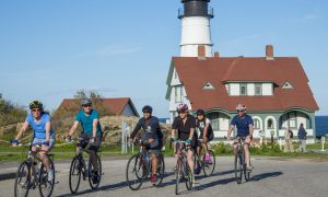 Group Biking near Lighthouse, Photo Credits: Summer Feet Cycling
