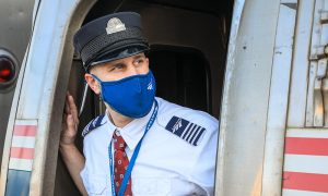 Conductor on Amtrak Downeaster. Photo Courtesy of NNEPRA